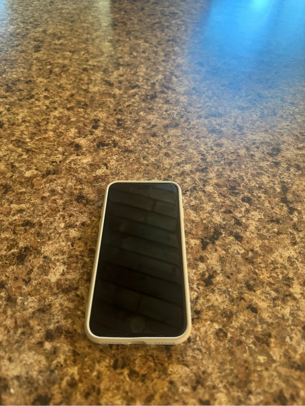 Apple iPhone with Silver Frame and Black Front IPhone 7